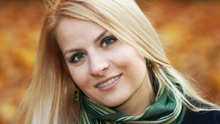 woman with blonde hair smilling