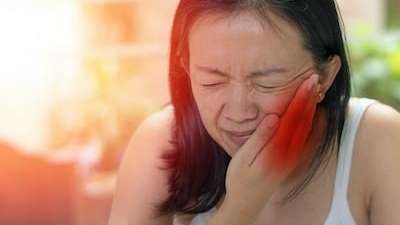 Girl Suffering from toothache