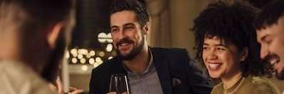 An image of people having dinner